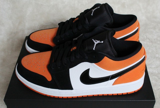 jordan 1 low orange and black