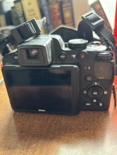 Nikon Camera Bag Strap, includes charging cord and memory cards