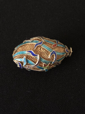 Silver pendant in gilding, made in filigree technique with enamels