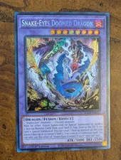 Snake-Eyes Doomed Dragon Secret Rare SUDA-EN035 Near Mint 1st Ed Yu-Gi-Oh!