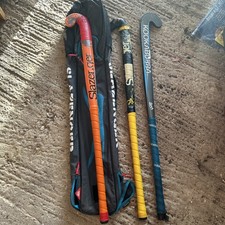 Kookaburra hockey stick, Slazenger sticks x2 and a cover 