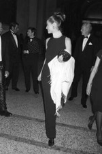 Model Christy Turlington wearing a long Versace dress pearls at th- Old Photo