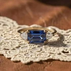Emerald Cut Blue Sapphire & Trillion Cut Moissanite Three Stone Ring, 925 Silver
