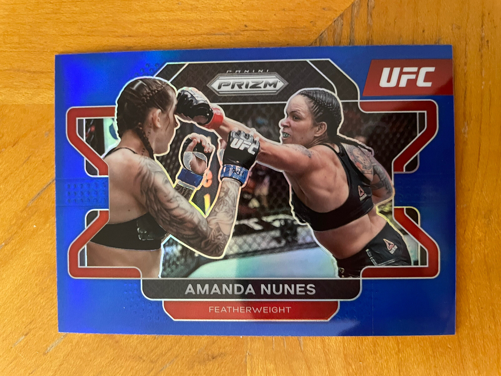 2022 Panini Prizm UFC Prizms Blue #65 Amanda Nunes /199