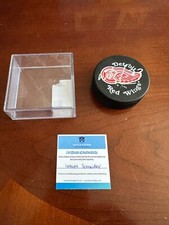 Mathieu Schneider #23 Autographed Detroit Red Wings Hockey Puck