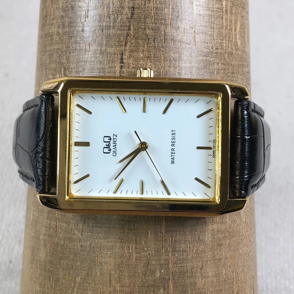 Reloj analógico de cuarzo rectangular de cuero negro vintage Q & Q para mujer de 28 mm 7" Foto 2 de 4