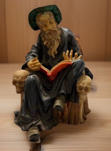 Wizard Resin Figurine with Green Hat, Book, and Skulls - Fantasy Statue