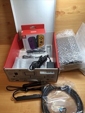 Nintendo Switch OLED Purple with Orange Joy-Con Complete in Box