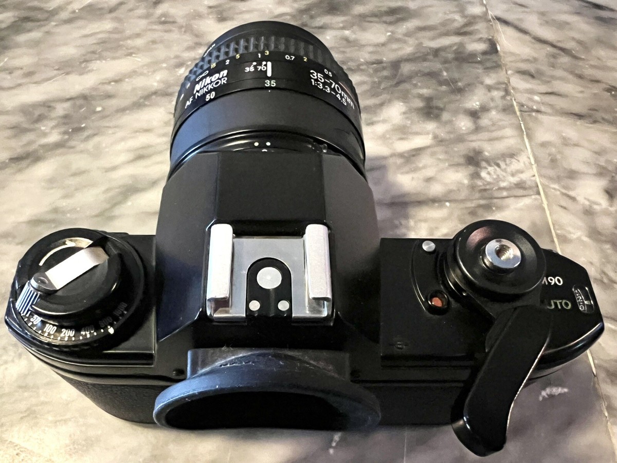 Nikon FE & EM 35mm SLR Film Camera with Nikon AF 35-70mm