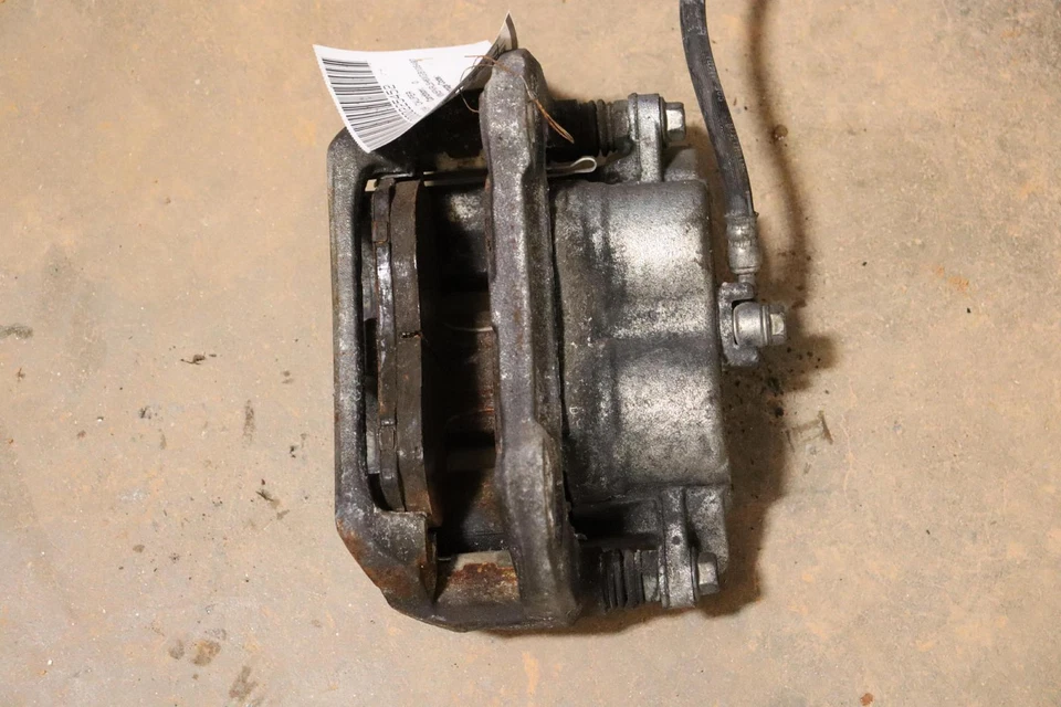 Pinza de freno delantera izquierda Honda Odyssey 2011-2017 con manguera OEM Foto 3 de 4