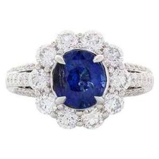 Features A 3.25 CT Blue Oval Cut Sapphire With Clear White CZ Cluster Women Ring
