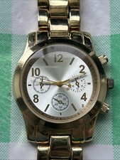 Gold Tone Silver Dial Women s Quartz Watch