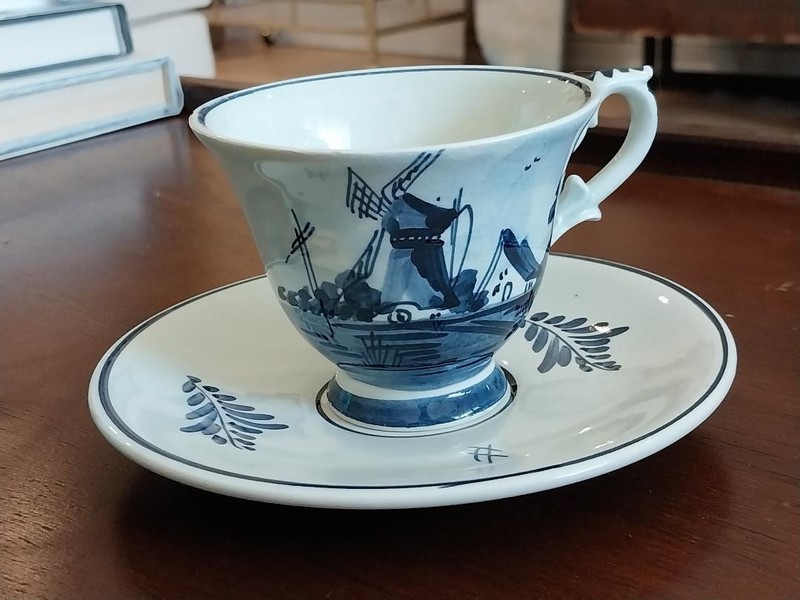 Vintage Delft Holland blue and white hand-painted teacup and saucer, tiny chip