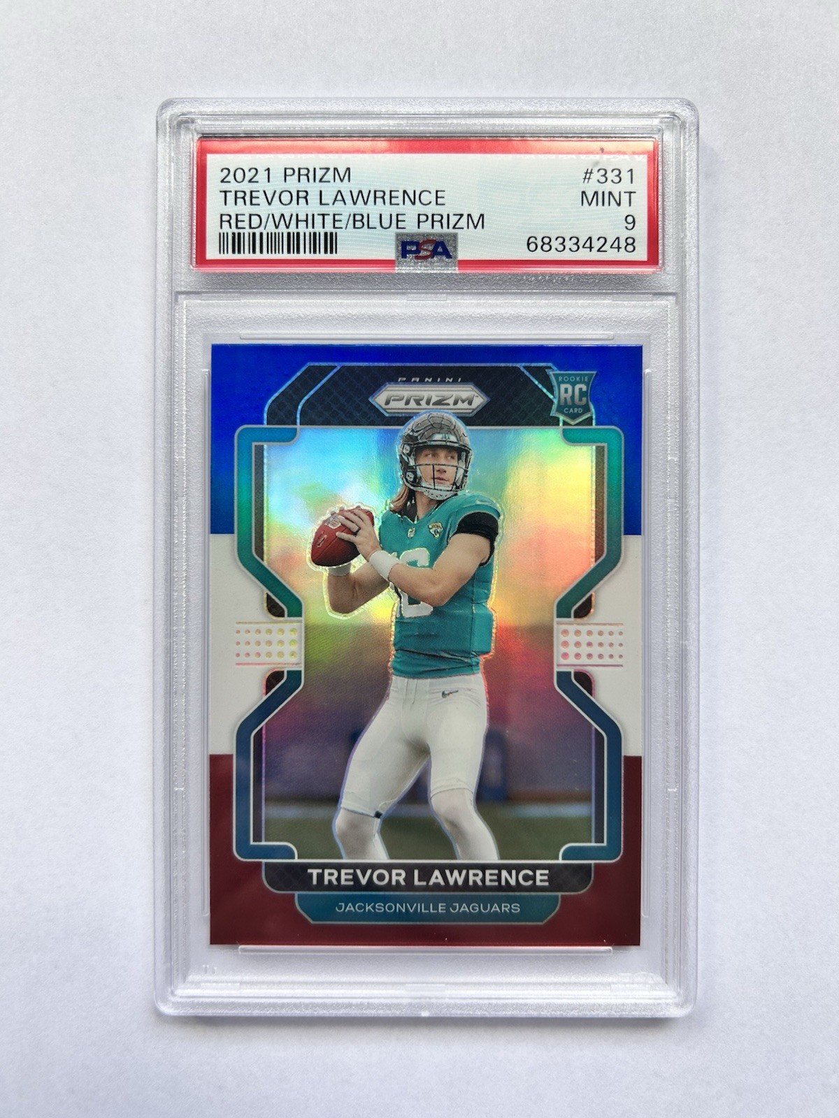 2021 Panini Prizm Rookie Trevor Lawrence #331 Red White Blue Prizm (RC) PSA 9