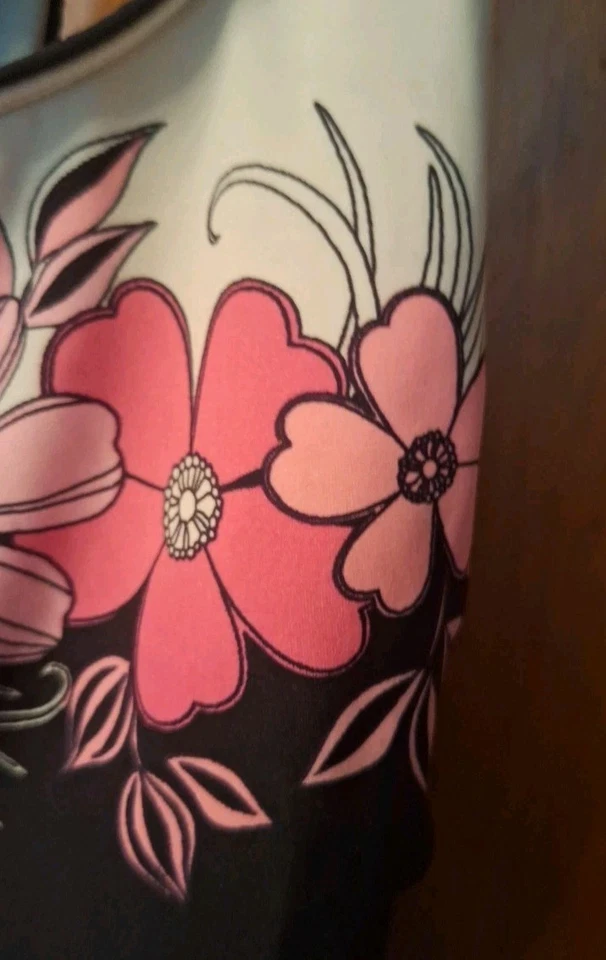 Traje de baño sin mangas Reebok talla 14 negro con flores rosas blanco en la parte superior forrado al frente Foto 3 de 4