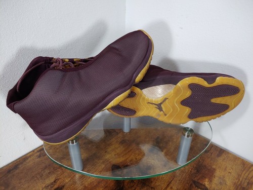 burgundy gold jordans