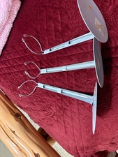 3 doll stands