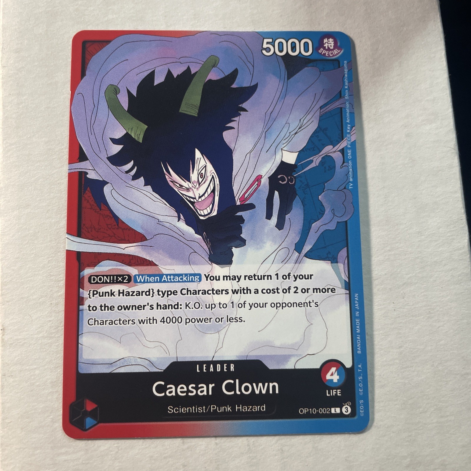 One Piece TCG - Royal Blood: Caesar Clown (OP10-002) - Leader - Near Mint