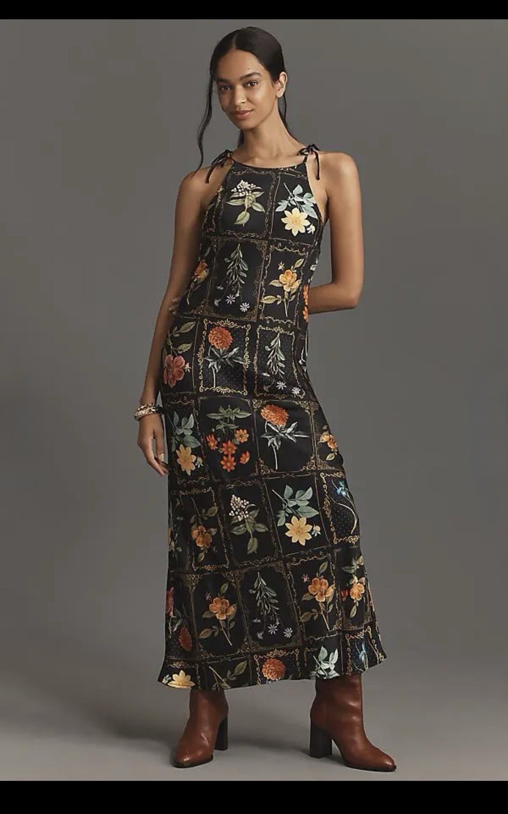 midi dress by Anthropologie features tie neck straps and a column silhouette.