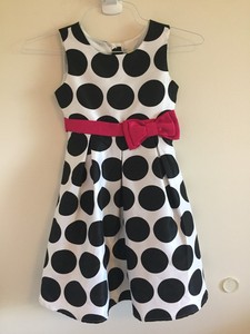 pink dress with black dots
