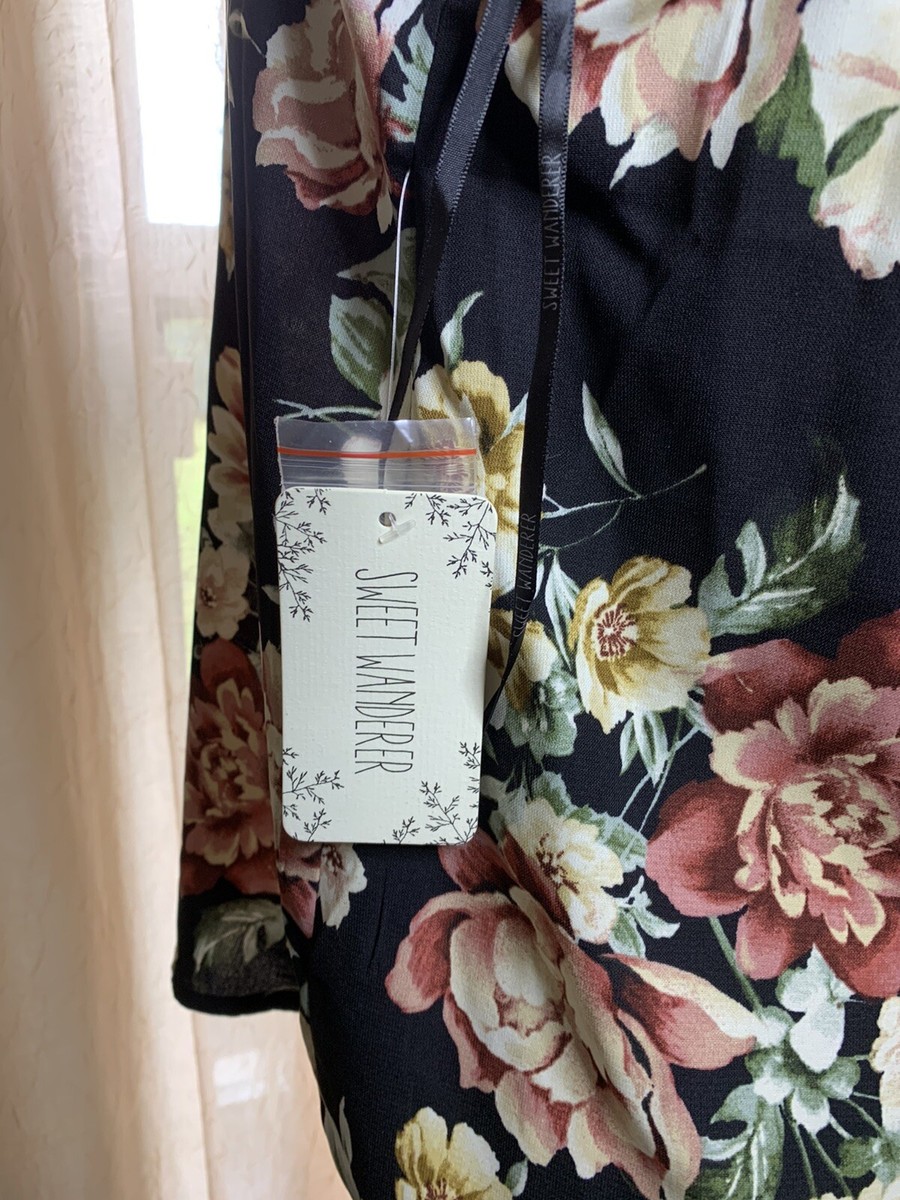 The Sweet Wanderer Women's Sleeveless Blouse is a stylish and