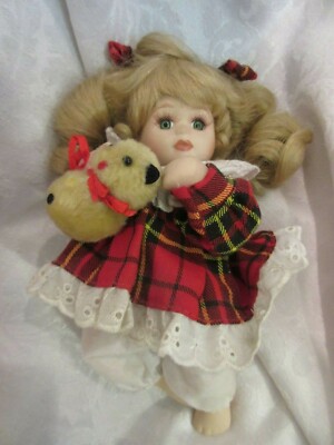 8 in. Porcelain Baby doll by McField 