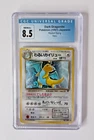 1997 POKEMON TCG DARK DRAGONITE JAPANESE ROCKET GANG HOLO CGC 8.5 NM/MINT