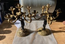 PAIR OF VINTAGE BRASS CANDELABRAS FEATURING A CHERUB FIGURE ON BASE 38CM