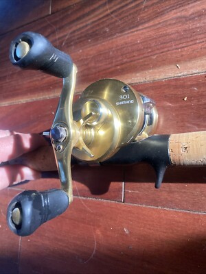 Calcutta Conquest Shimano 301 With G Loomis IMX Rod