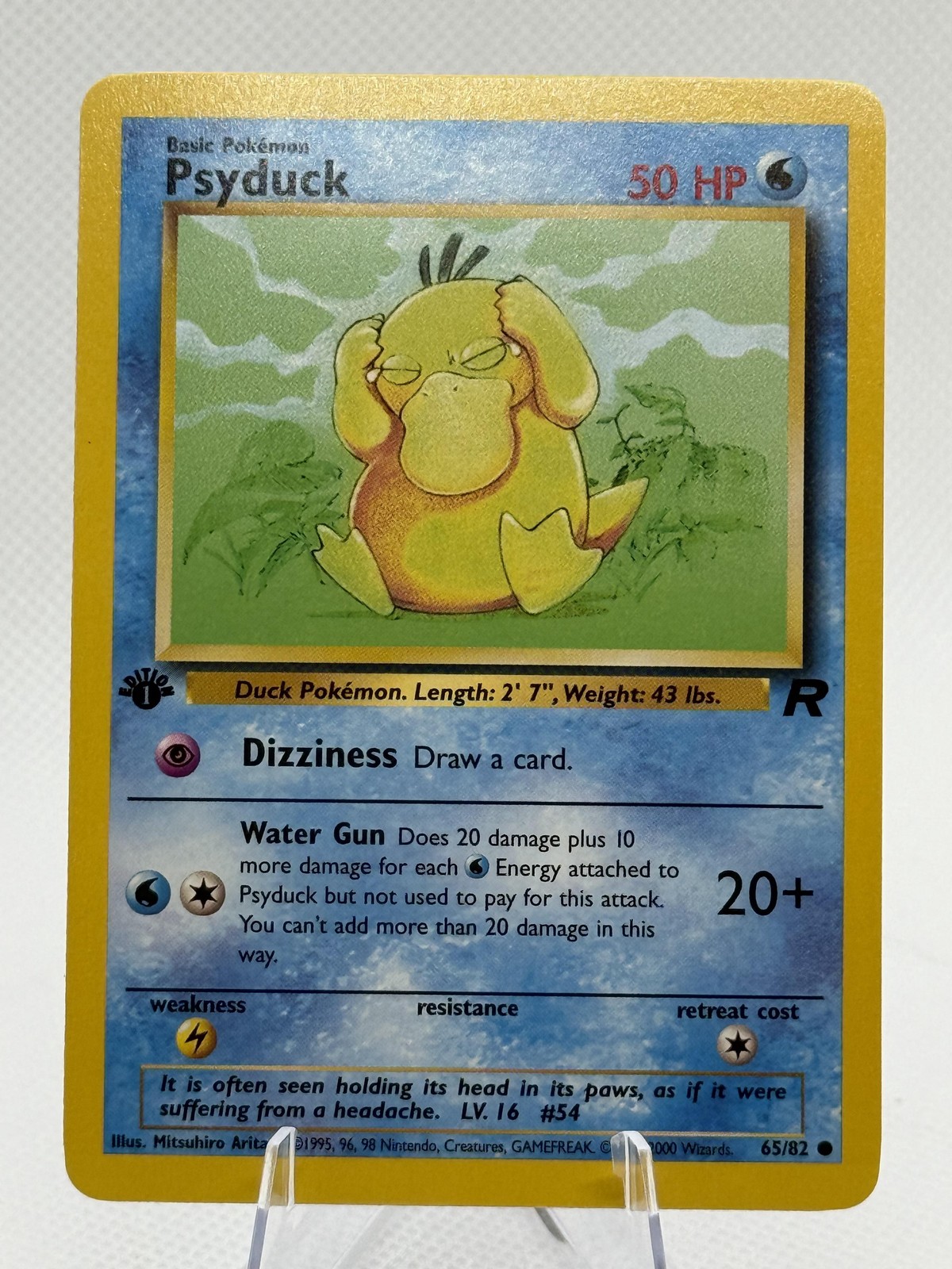 Psyduck - 1st Edition - 65/82 Team Rocket - WOTC - Pokémon TCG - 2000 NM