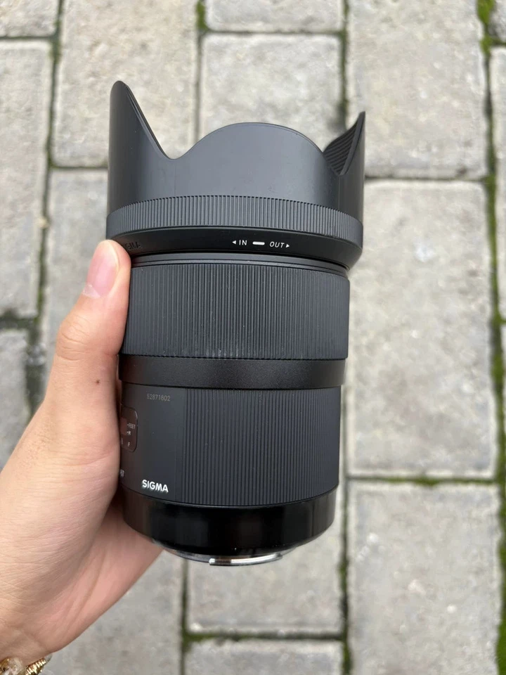 Lente Sigma 35 mm f/1,4 DG HSM Art Prime para montura Canon EF / para Nikon F- 95 % nueva Foto 2 de 4