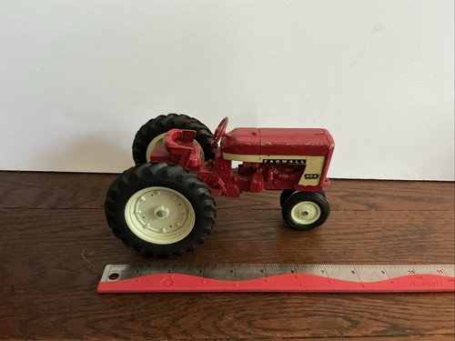 Vintage Toy Farmall International 404 Tractor about 8” long; ES0727