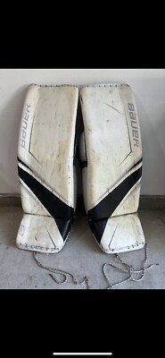 Bauer 2s Pro pads used for one season in good condition, besides cut on left pad