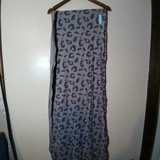 Moby Wrap baby carrier in a grey leopard print.