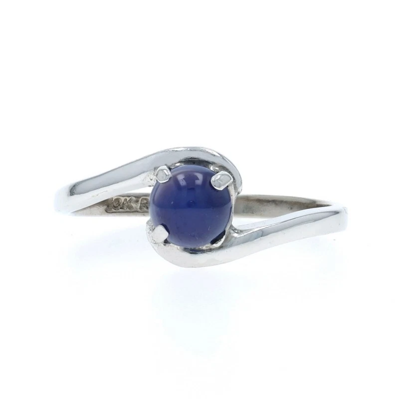 Bague de fiançailles halo or blanc 18K saphir bleu et diamants - Élégante et précieuse