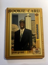 Dikembe Mutombo Rookie Card in protecting case NBA Draft #3 Upper Deck 1991. rookie card picture