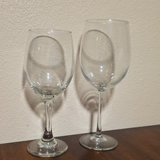 Two Wine Glasses, One Unmakred, One Buffalo W...