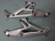 Coppia ganci poggiapiedi Ducati Monster con picchetti adatti 400 600 620 695 750 900