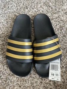 adidas adilette slides black gold