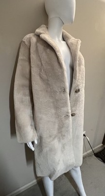 Sandro Mid-Length Sheepskin Coat（$2245）