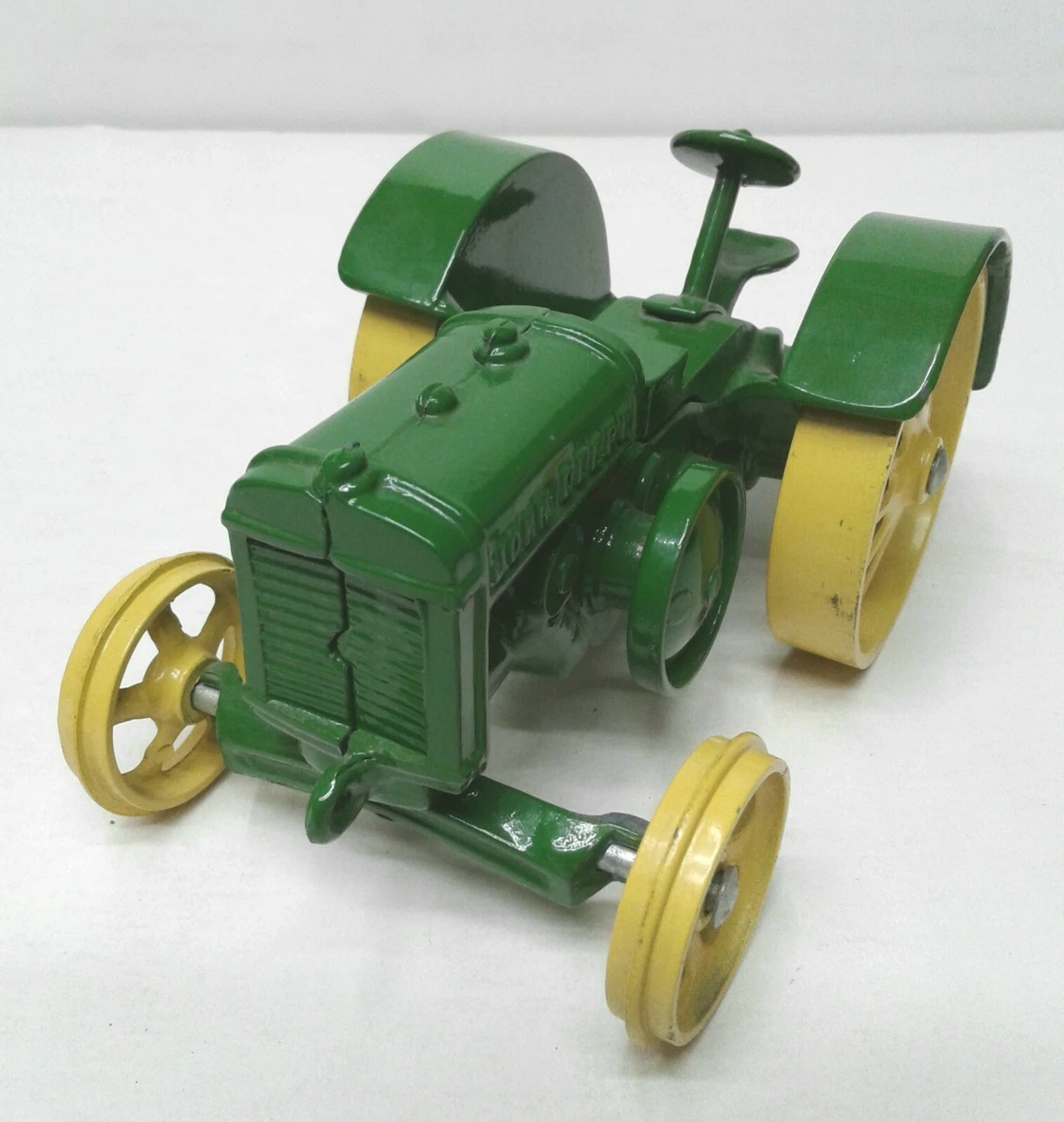 John deere cast hotsell iron toy tractor