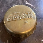 Vintage Coca Cola brass paperweight