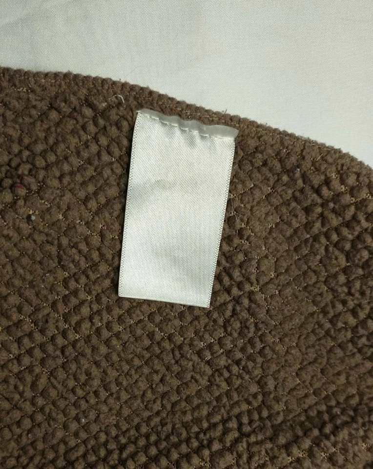 Manta bebé vieja marrón recién nacido en hoja de rama de árbol verde azul usada Foto 4 de 4