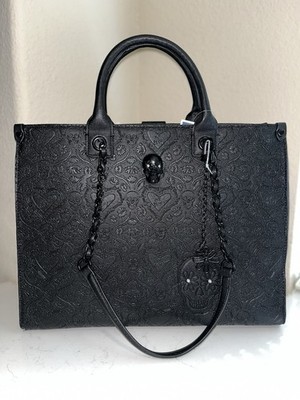 NWT BETSEY JOHSON  EMBOSSED SKULL DESIGN WITH NON REMOVABLE STRAPS HANDBAG