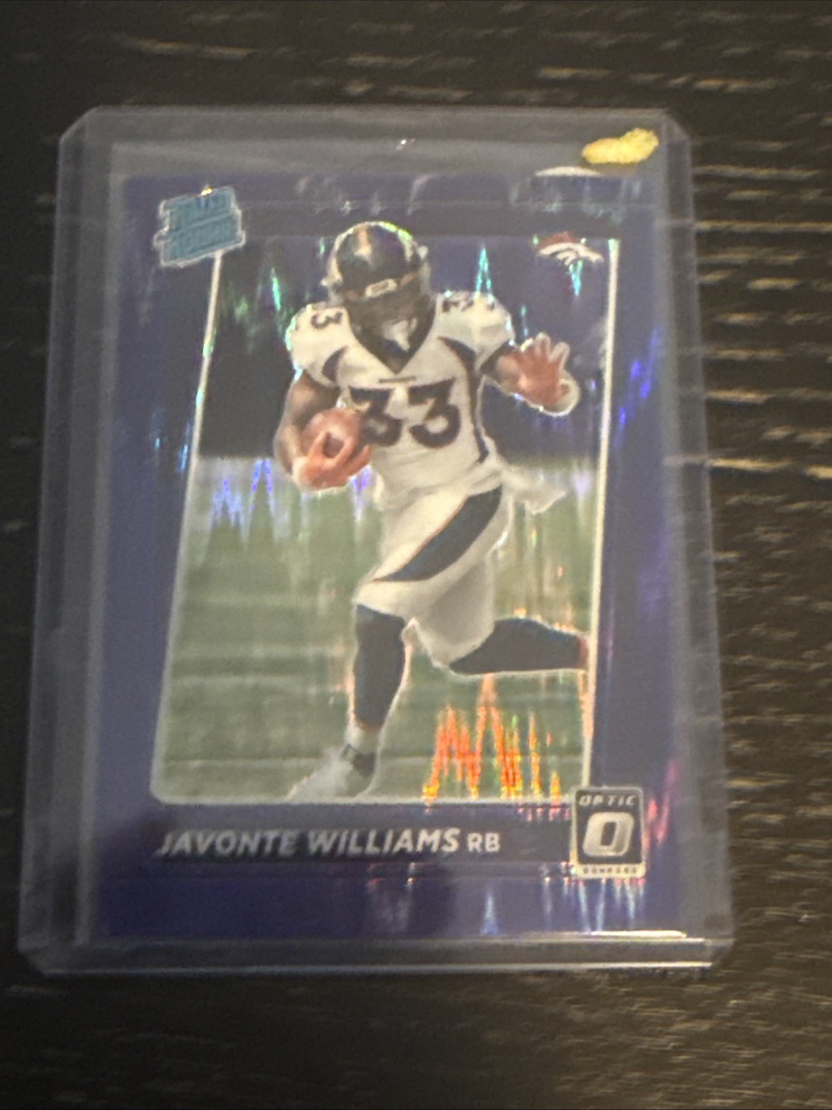 2021 Donruss Optic Rated Rookie Purple Shock Prizm #215 Javonte Williams (RC)