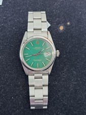 VINTAGE 1967 ROLEX OYSTER PERPETUAL DATE OYSTERSTEEL 1500 CUSTOM GRE (TC4037834)