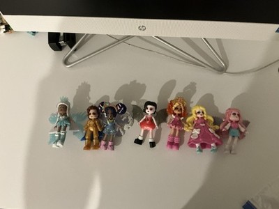 Royale high large vault includes 7 action figures/ dolls and 4 pairs of wings