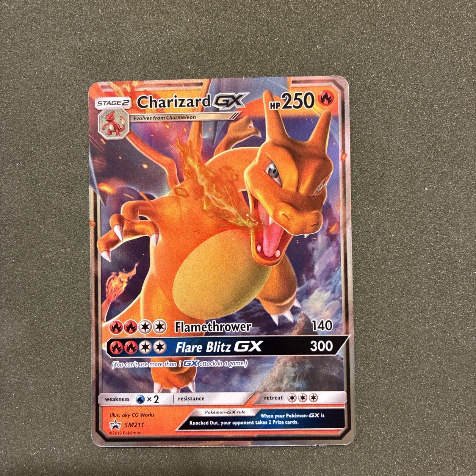 Charizard GX Black Star Promo SM211 Holo English Sun and Moon NM Pokémon Card