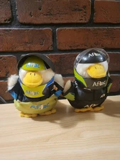 Pair of Aflac Racing Themed Duck Plush Toys