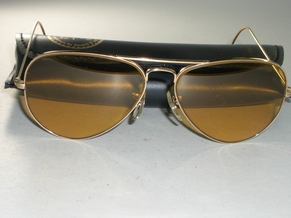 1960s CIRCA 58mm VINTAGE B&L RAY BAN WRAP-AROUNDS AMBERMATIC